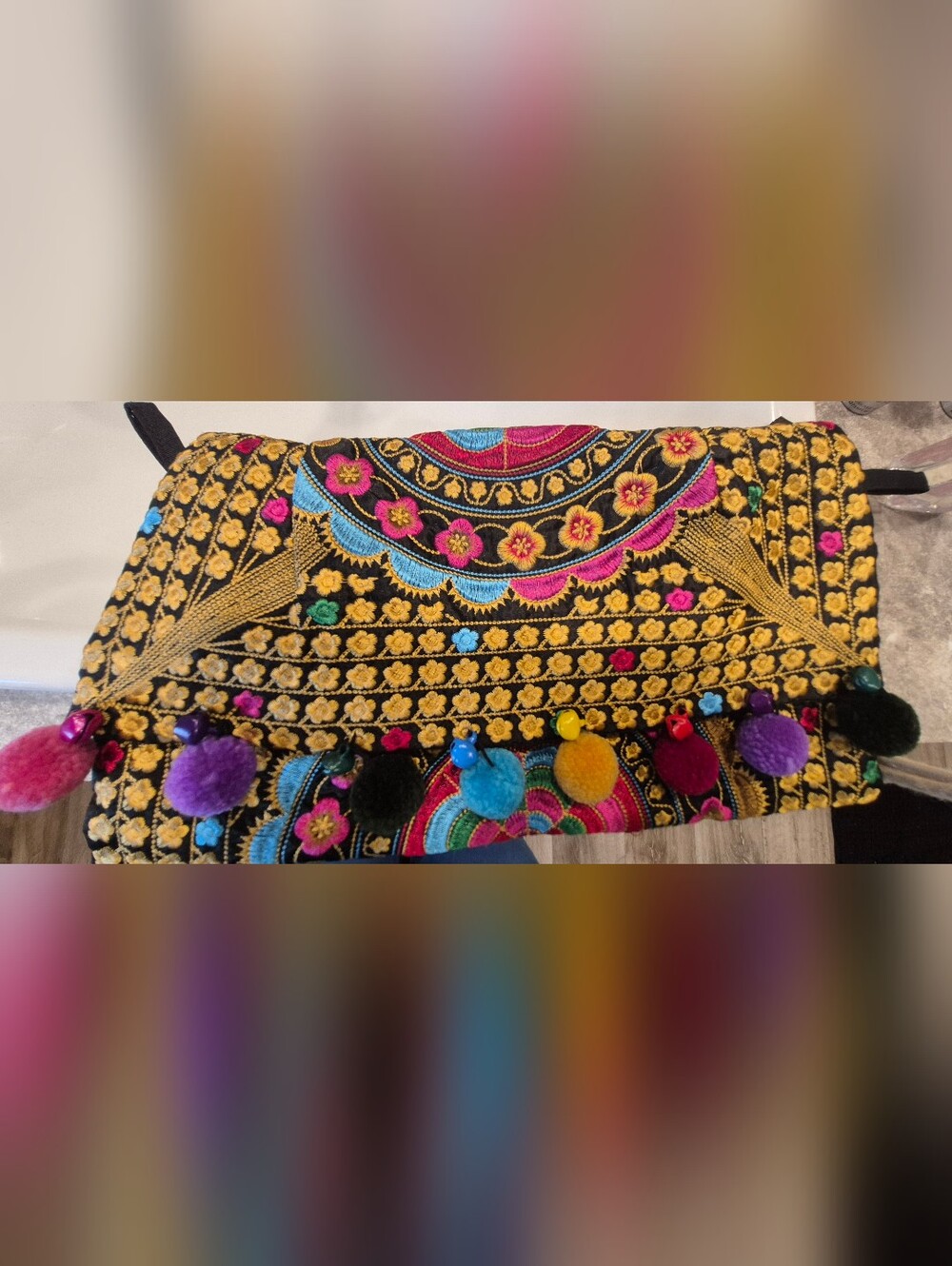 Embroidered Black Statement Clutch with Colorful Pom Tassels